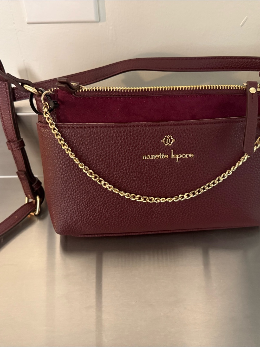 Nanette Lepore Wine Crossbody Bag with Gold Chain Trim